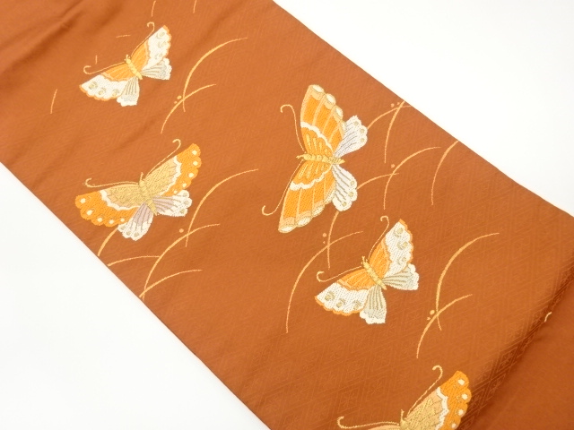 Nagoya obi woven with butterfly pattern on dew grass